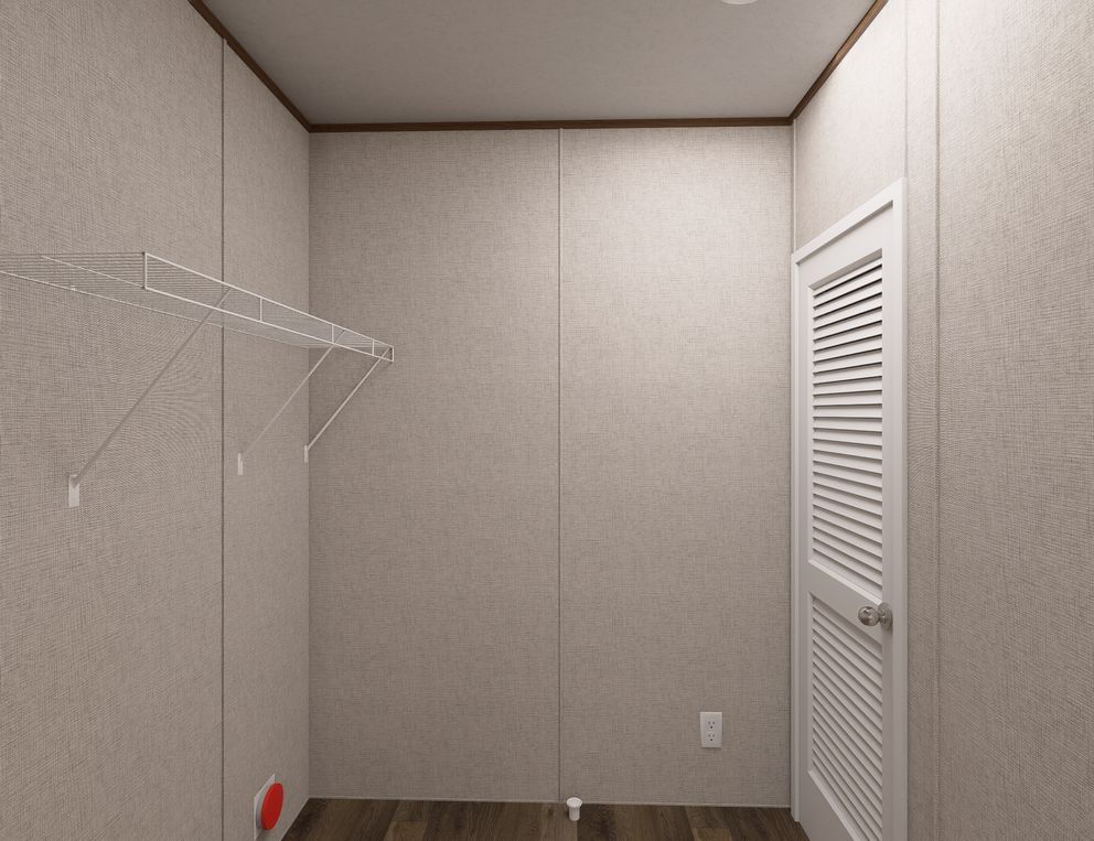 The ELM Utility Room. This Manufactured Mobile Home features 2 bedrooms and 1 bath.