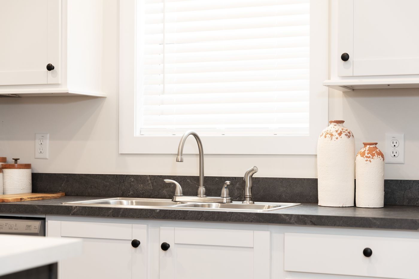 The CENTER ST/5228-MS014-1 SECT Kitchen. This Manufactured Mobile Home features 3 bedrooms and 2 baths.