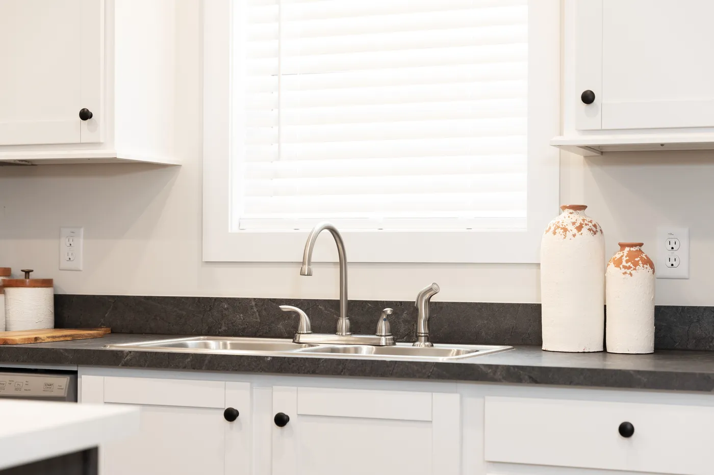The CENTER ST/5228-MS014-1 SECT Kitchen. This Manufactured Mobile Home features 3 bedrooms and 2 baths.