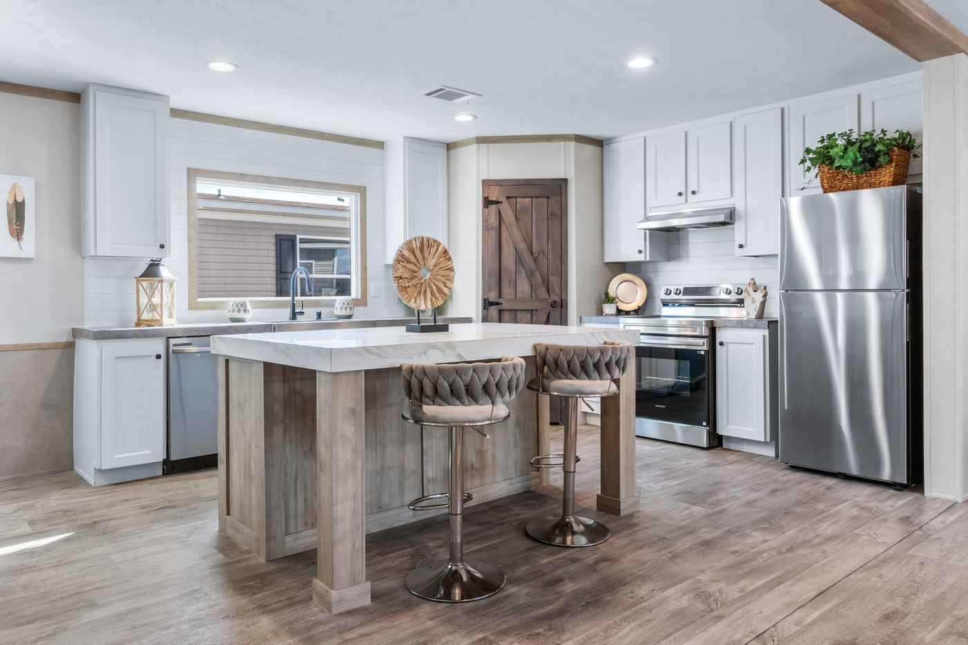 The PT 78 Kitchen. This Manufactured Mobile Home features 3 bedrooms and 2 baths.