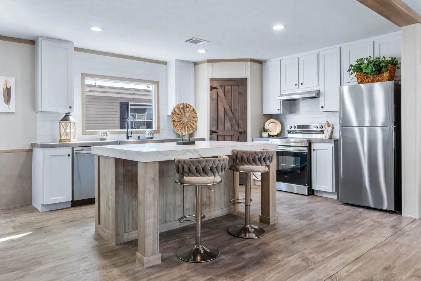 The PT 78 Kitchen. This Manufactured Mobile Home features 3 bedrooms and 2 baths.