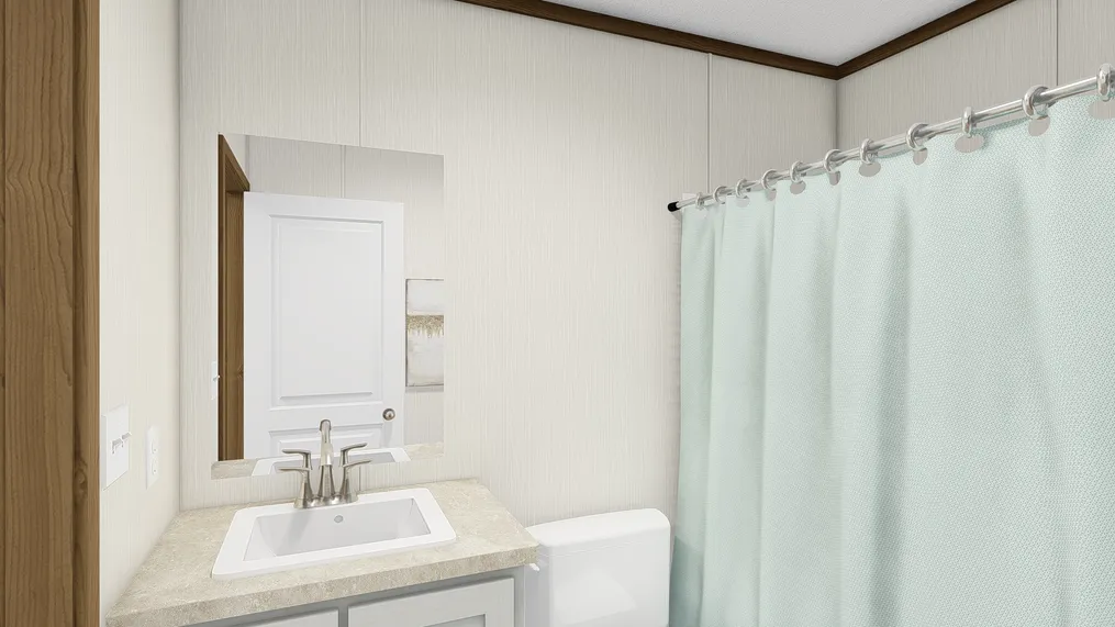 The ESSENCE Guest Bathroom. This Manufactured Mobile Home features 3 bedrooms and 2 baths.