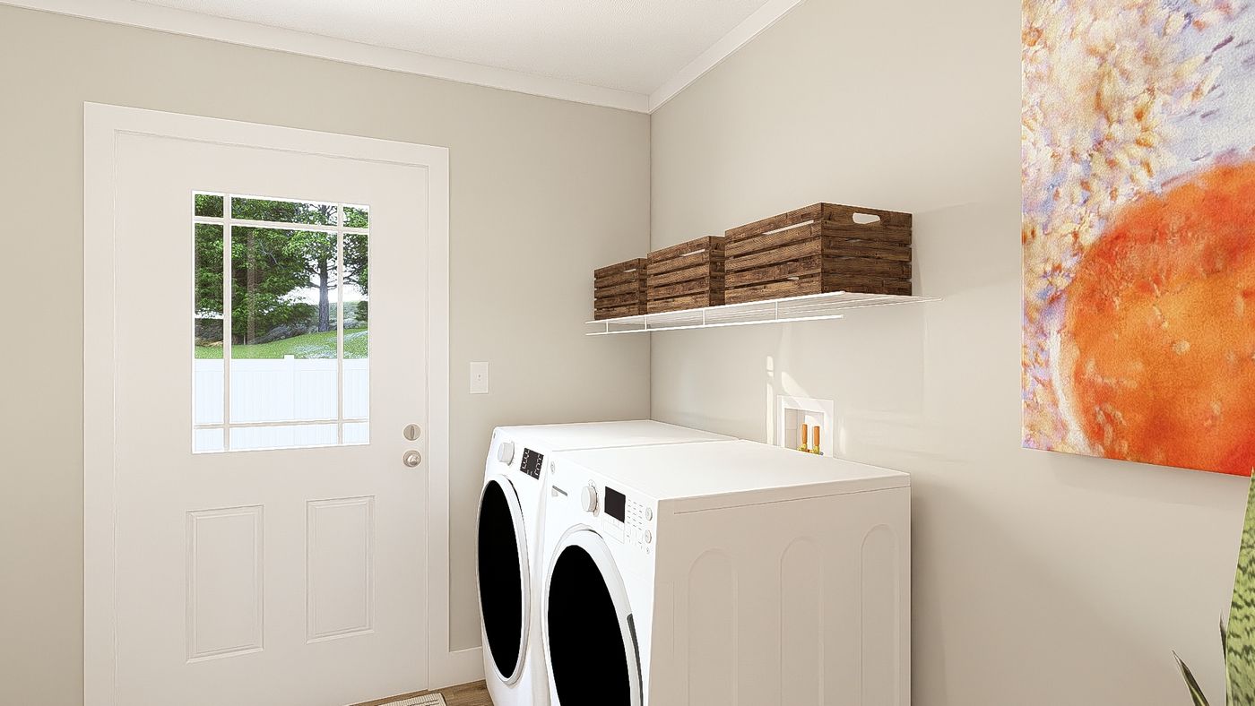 The THE BREEZE 64 Utility Room. This Manufactured Mobile Home features 4 bedrooms and 2 baths.