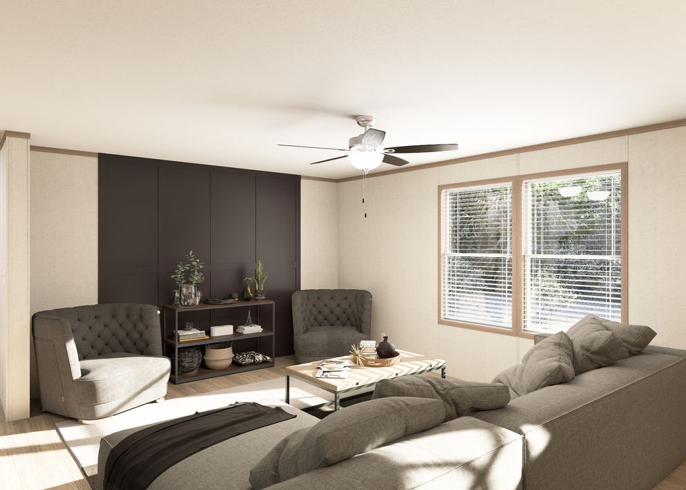 The THE RESERVE 60 Living Room. This Manufactured Mobile Home features 3 bedrooms and 2 baths.