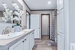 The THE GRAND Primary Bathroom. This Manufactured Mobile Home features 3 bedrooms and 2 baths.