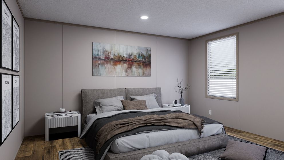 The MOUNTAIN BREEZE 3260 Primary Bedroom. This Manufactured Mobile Home features 3 bedrooms and 2 baths.