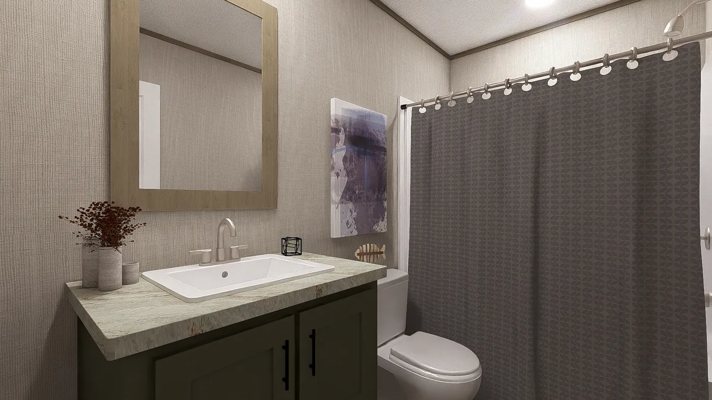 The RIO Guest Bathroom. This Manufactured Mobile Home features 3 bedrooms and 2 baths.