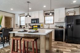 The ULTRA EXCEL 3 BR 28X56 Kitchen. This Manufactured Mobile Home features 3 bedrooms and 2 baths.