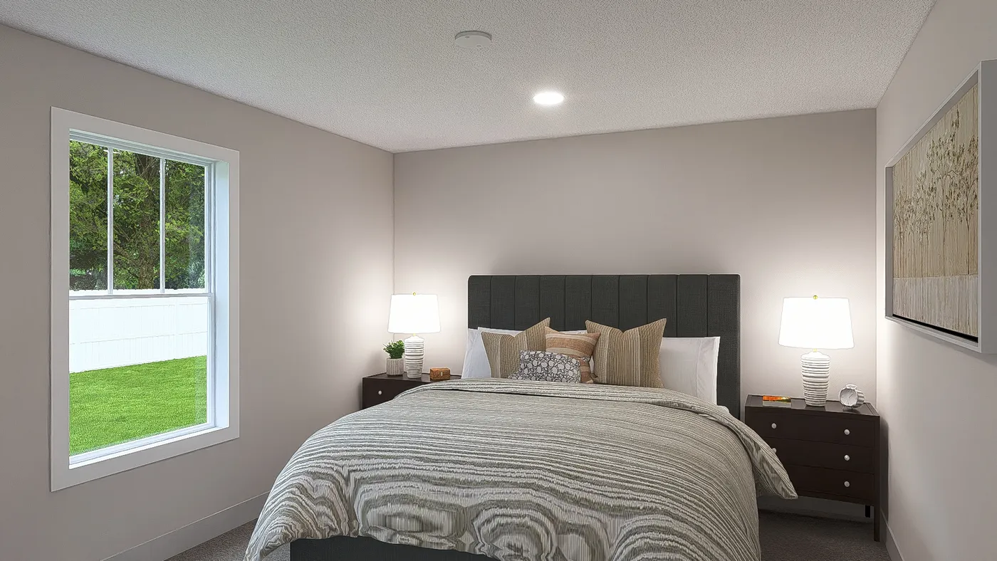The HERE COMES THE SUN Primary Bedroom. This Manufactured Mobile Home features 3 bedrooms and 2 baths.