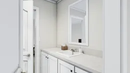 The COUNTRY AIRE Guest Bathroom. This Manufactured Mobile Home features 3 bedrooms and 3 baths.