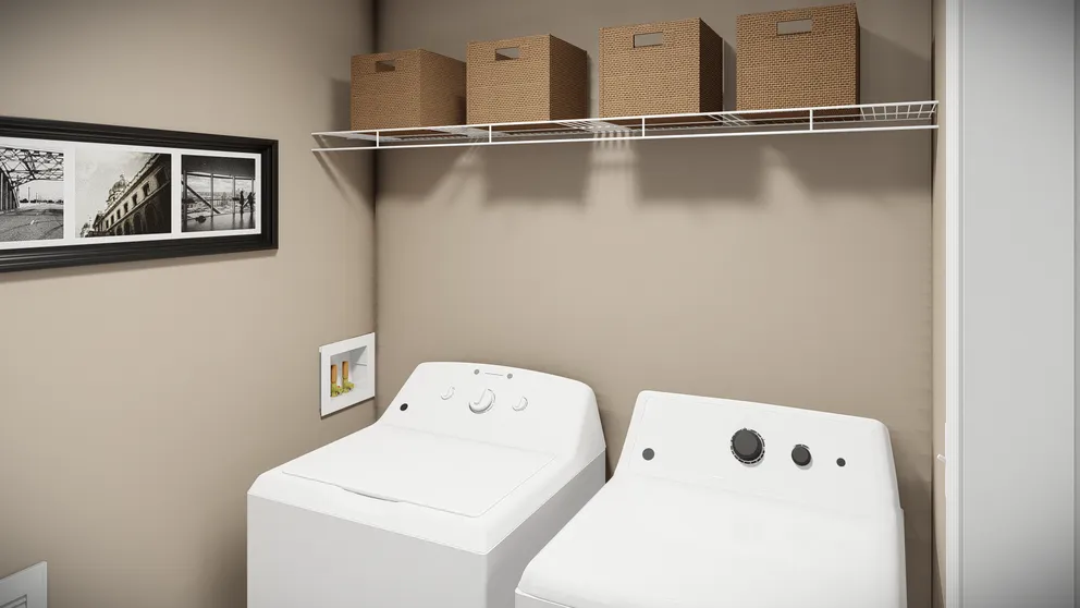 The THE MAVERICK Utility Room. This Manufactured Mobile Home features 3 bedrooms and 2 baths.