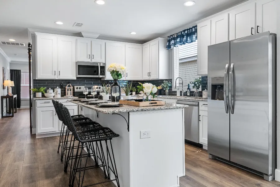 The THE SEDONA 4 Kitchen. This Manufactured Mobile Home features 4 bedrooms and 2 baths.