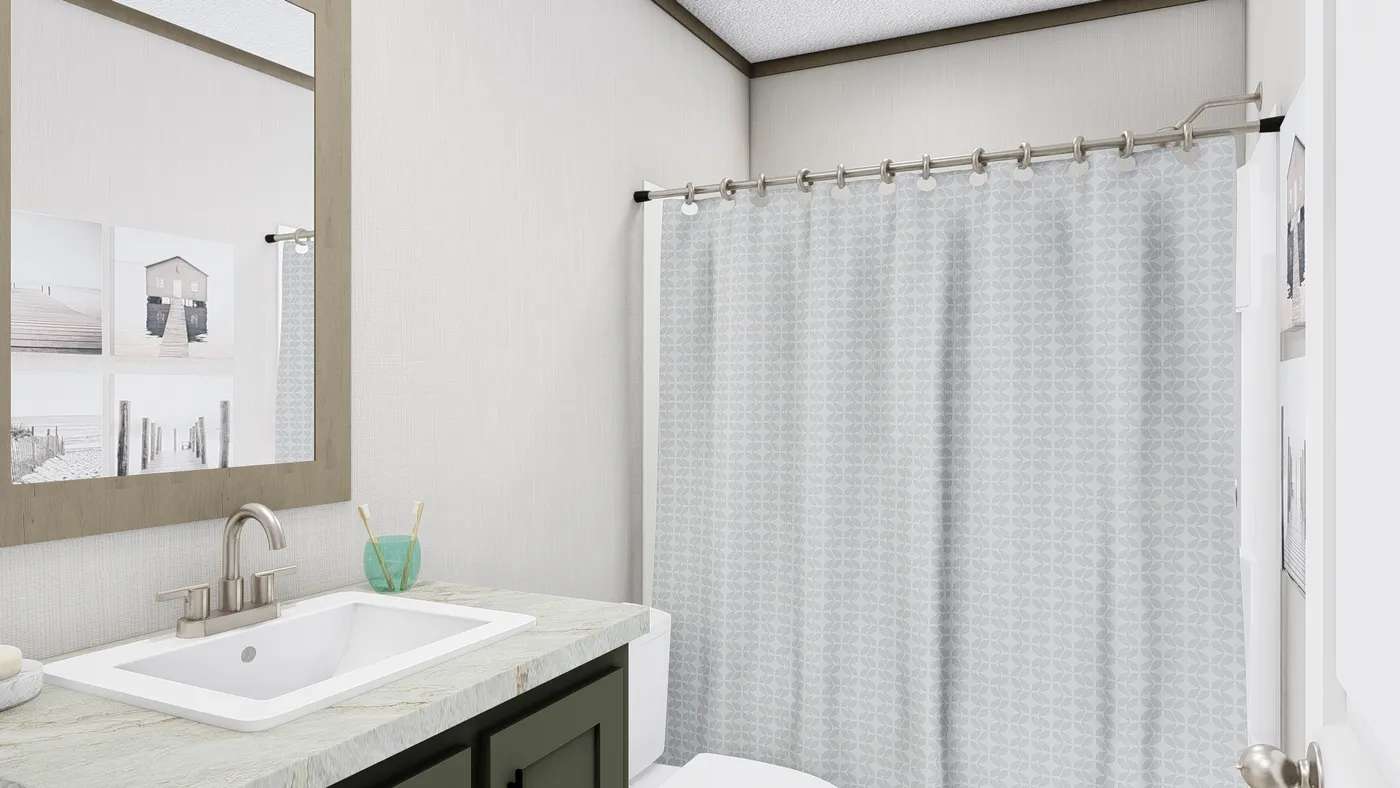 The BOONE Guest Bathroom. This Manufactured Mobile Home features 4 bedrooms and 2 baths.