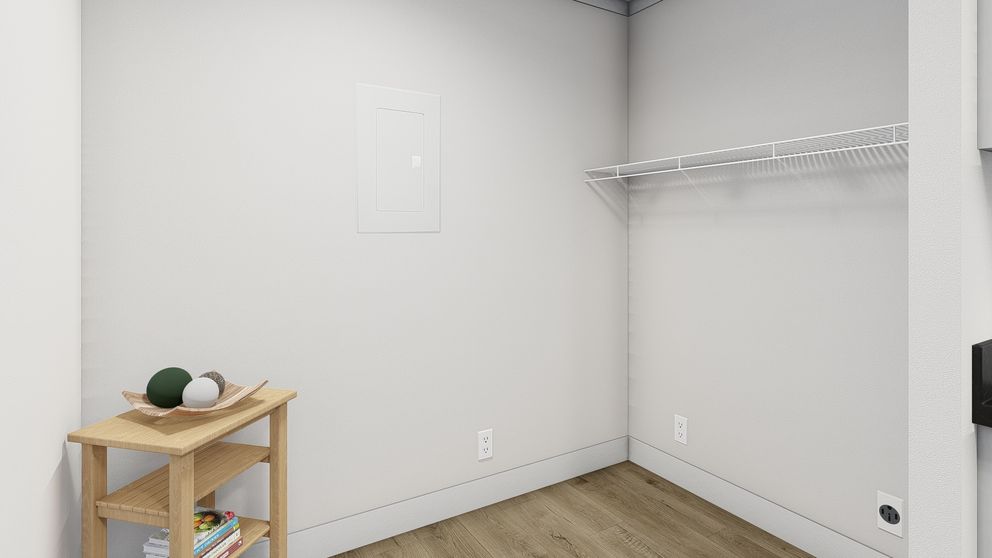 The BORN TO RUN Utility Room. This Manufactured Mobile Home features 2 bedrooms and 2 baths.
