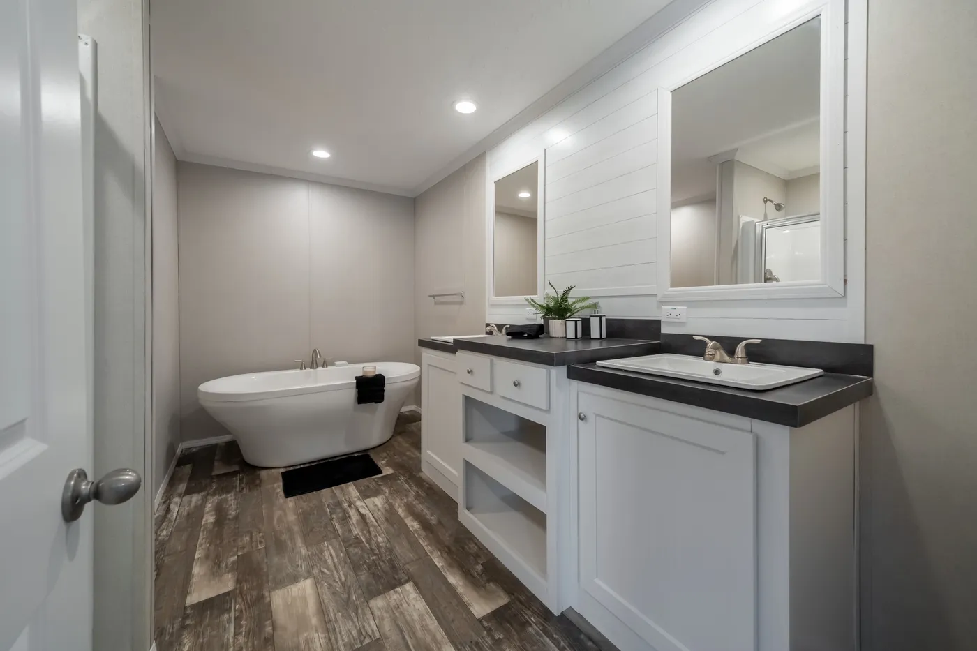The NORTHSHORE Primary Bathroom. This Manufactured Mobile Home features 3 bedrooms and 2 baths.