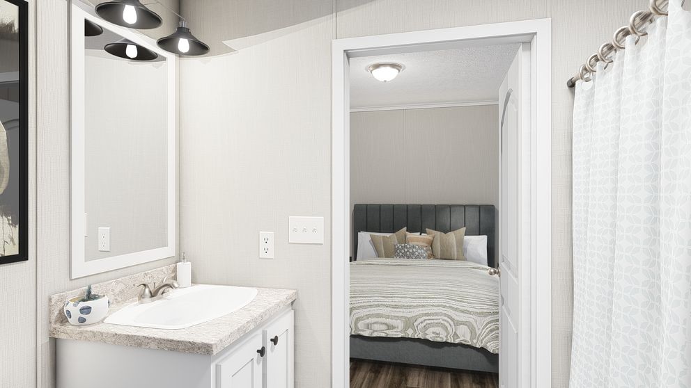 The THE FUSION 32H Guest Bathroom. This Manufactured Mobile Home features 5 bedrooms and 3 baths.