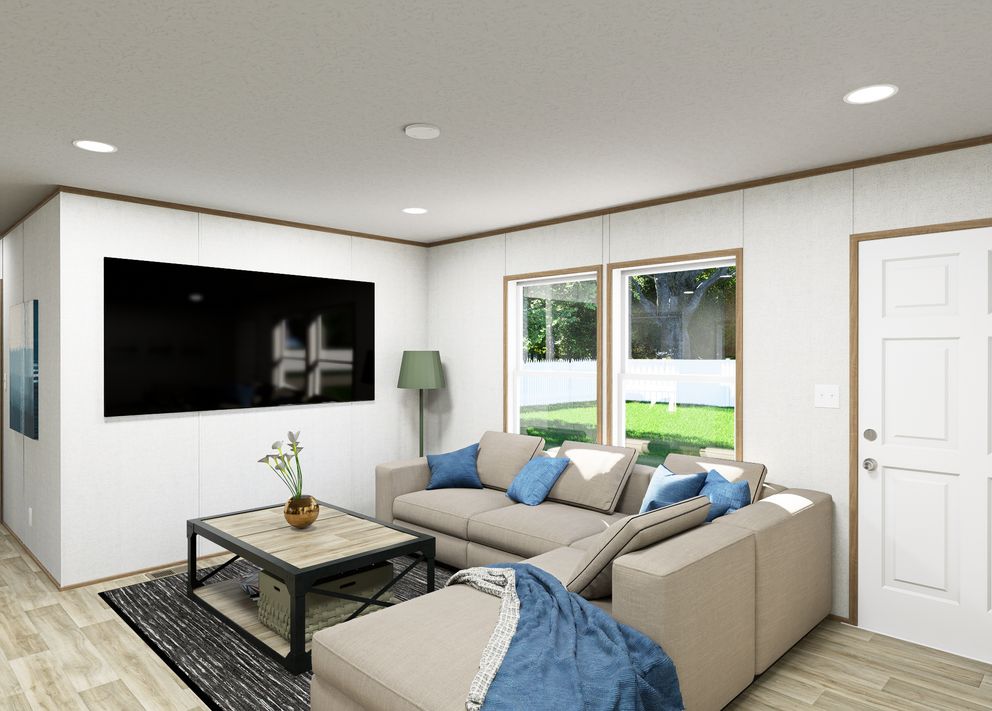 The VISTA Living Room. This Manufactured Mobile Home features 3 bedrooms and 2 baths.