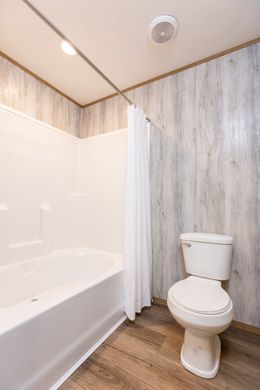 The SYDNEY 8016-1076 Primary Bathroom. This Manufactured Mobile Home features 3 bedrooms and 2 baths.