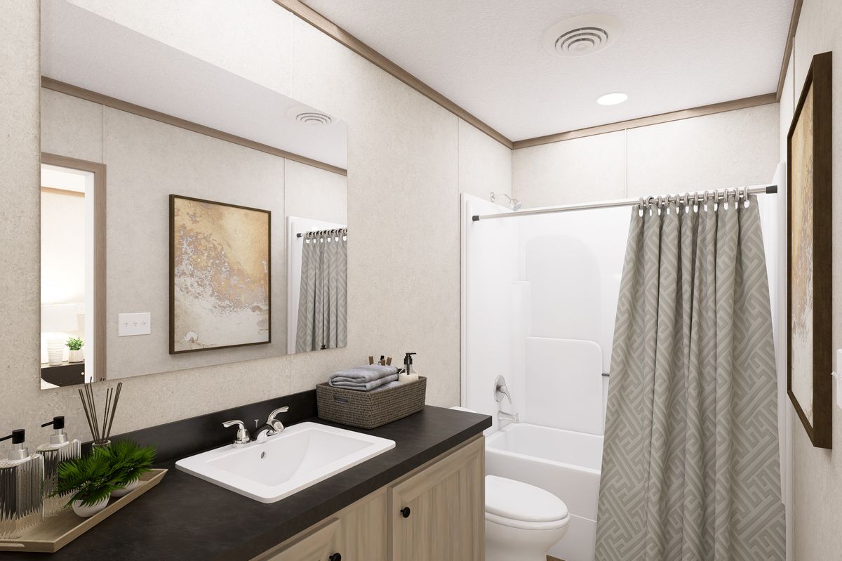 The 6616-CC03 HARBORVIEW 66 Primary Bathroom. This Manufactured Mobile Home features 3 bedrooms and 2 baths.