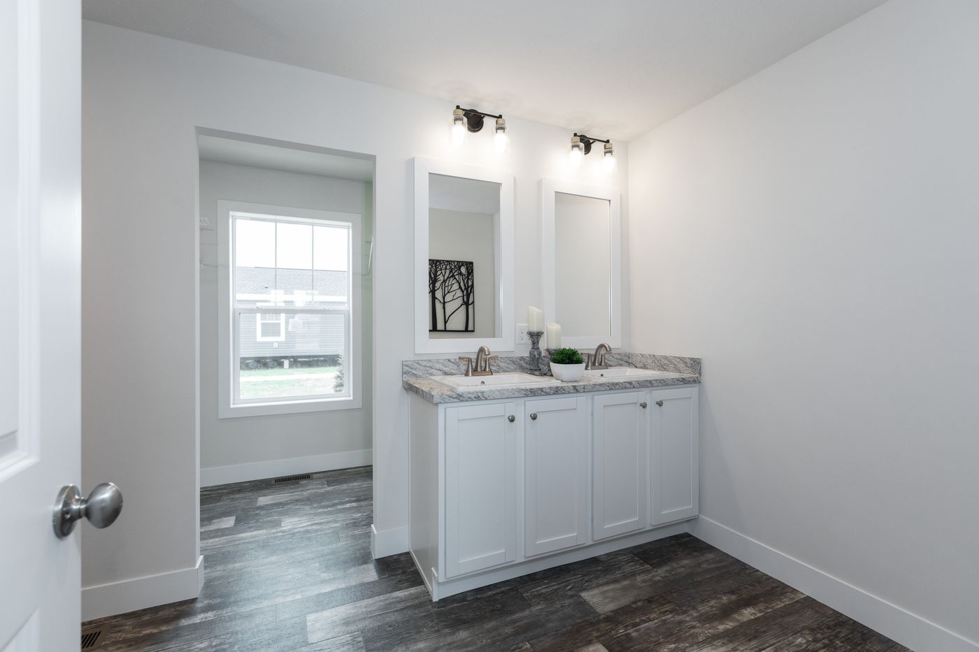 The ECLIPSE/6028-MS063 Primary Bathroom. This Manufactured Mobile Home features 3 bedrooms and 2 baths.