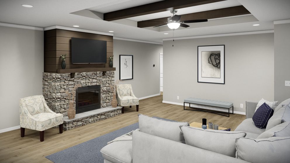The HUXTON II Living Room. This Manufactured Mobile Home features 4 bedrooms and 2 baths.