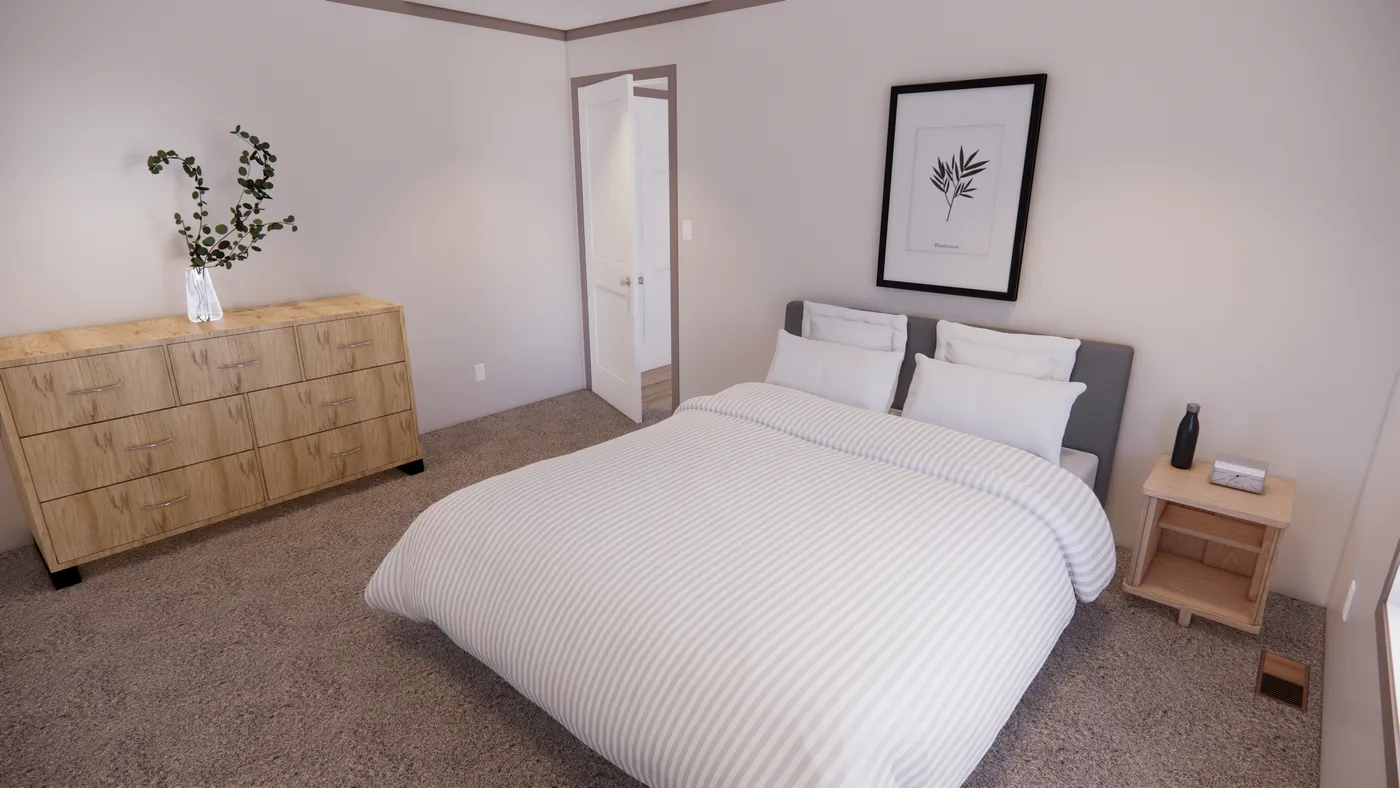 The 7616-4200 ADRENALINE Primary Bedroom. This Manufactured Mobile Home features 3 bedrooms and 2 baths.