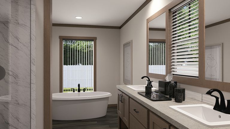 The LIZZIE ELITE Primary Bathroom. This Manufactured Mobile Home features 3 bedrooms and 2 baths.