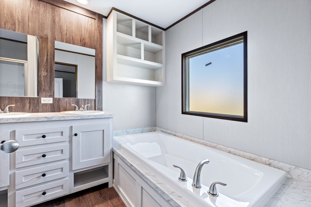 The ANNIVERSARY 16763S Master Bathroom. This Manufactured Mobile Home features 3 bedrooms and 2 baths.