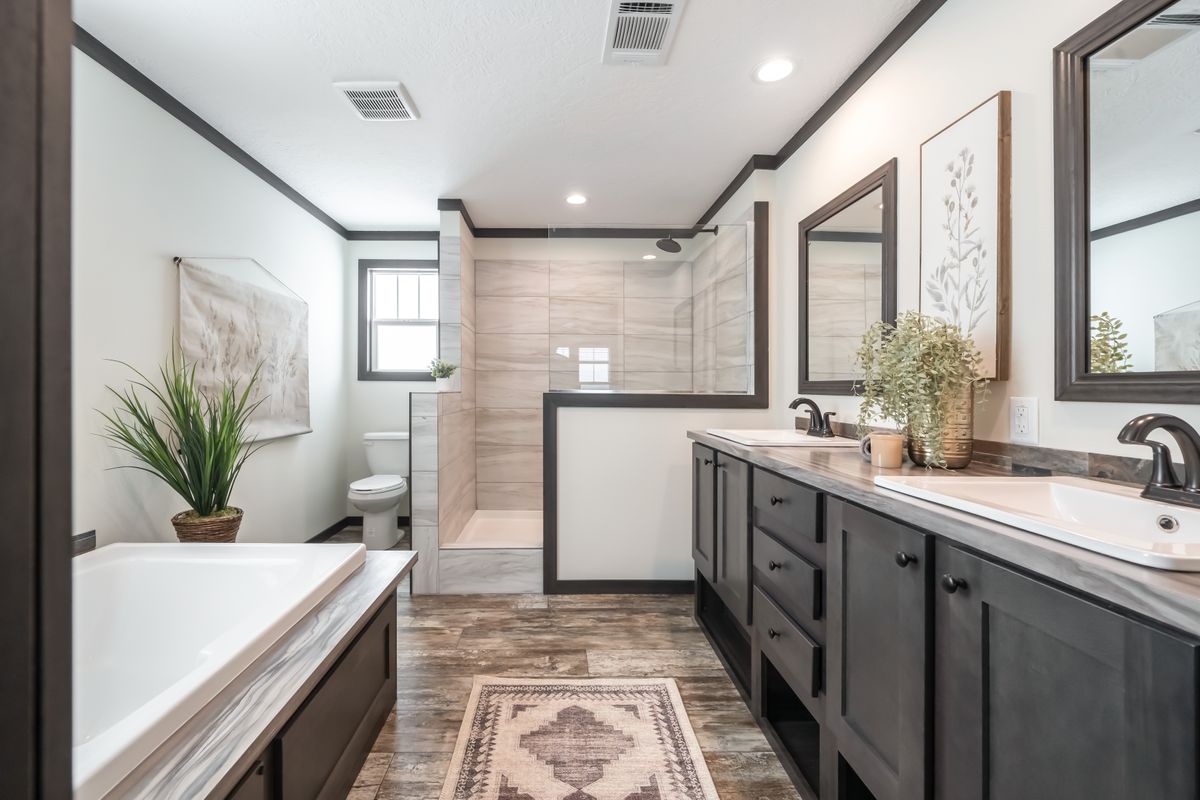 The BOUJEE 56 Primary Bathroom. This Manufactured Mobile Home features 3 bedrooms and 2 baths.