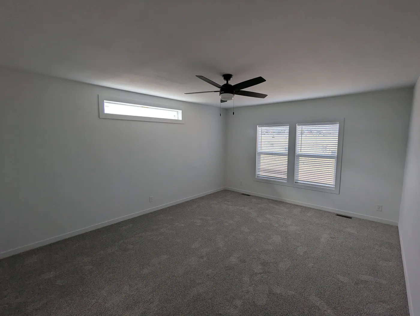 The LULABELLE 4 Primary Bedroom. This Manufactured Mobile Home features 4 bedrooms and 2.5 baths.