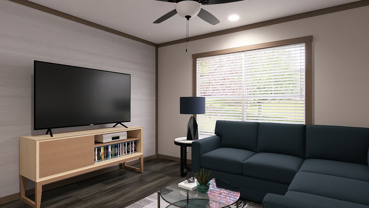 The FARM 4 FLEX Living Room. This Manufactured Mobile Home features 4 bedrooms and 3 baths.
