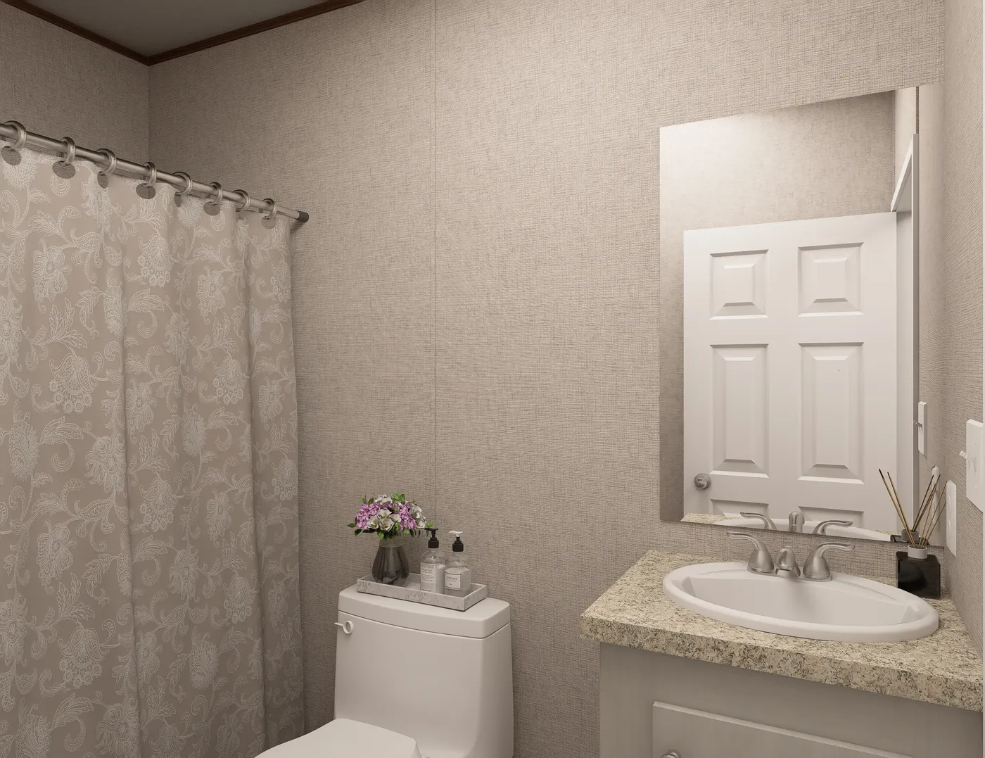 The SYCAMORE Guest Bathroom. This Manufactured Mobile Home features 4 bedrooms and 2 baths.