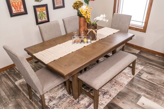 The CHEYENNE Dining Area. This Manufactured Mobile Home features 3 bedrooms and 2 baths.