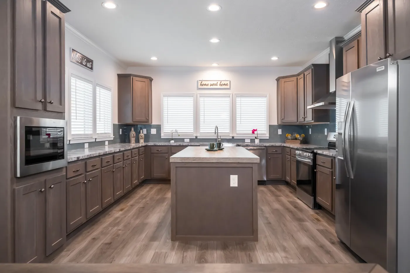 The 3458 MOD 76X32 CAROLINA RAELYN Kitchen. This Modular Home features 4 bedrooms and 3 baths.