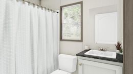 The ANNIVERSARY 16682A Guest Bathroom. This Manufactured Mobile Home features 2 bedrooms and 2 baths.