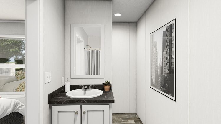 The TOPAZ Primary Bathroom. This Manufactured Mobile Home features 3 bedrooms and 2 baths.
