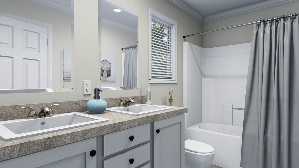 The 930  "HOLDEN" 7616 Primary Bathroom. This Manufactured Mobile Home features 3 bedrooms and 2 baths.