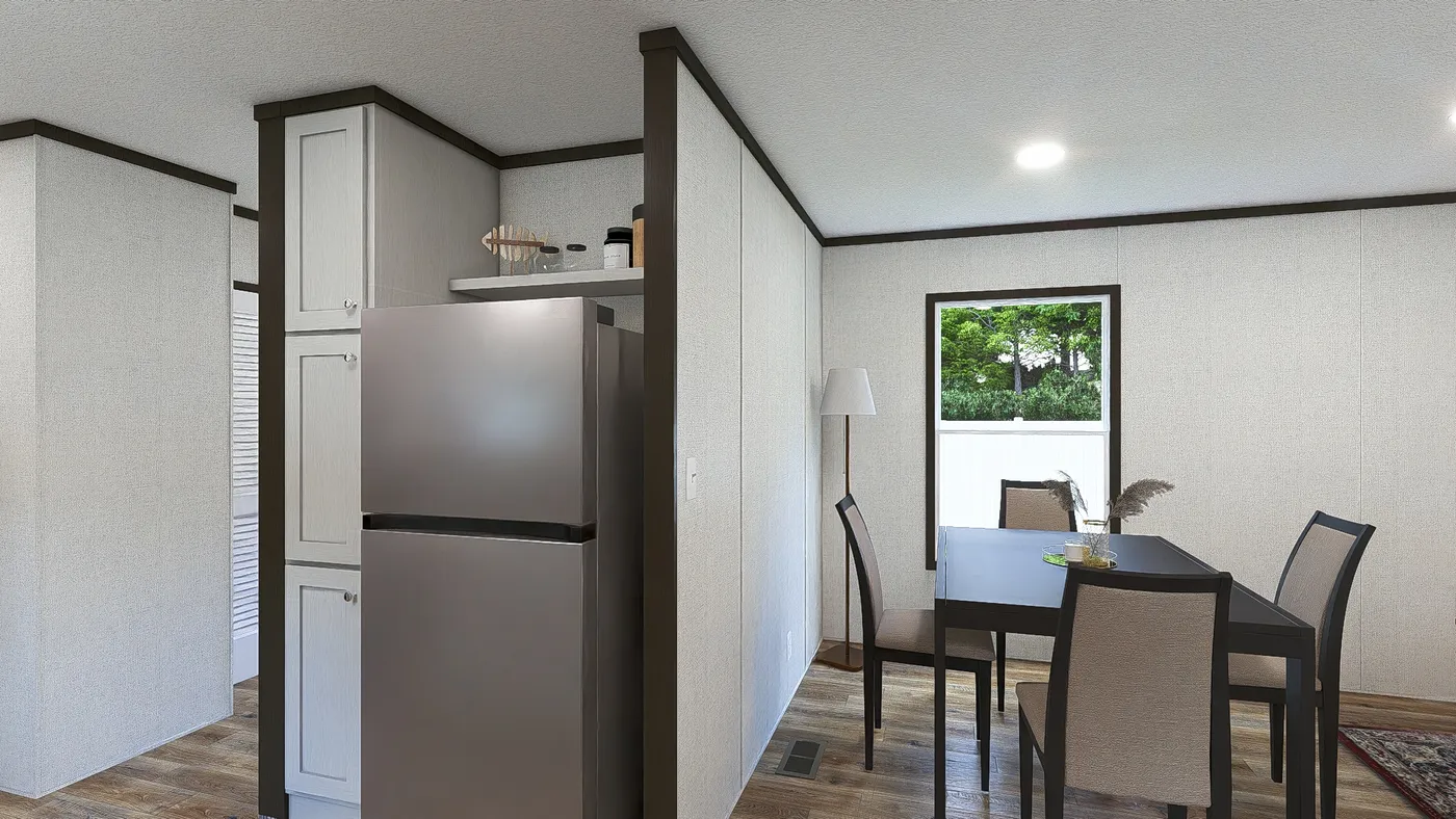 The DESIRE Dining Area. This Manufactured Mobile Home features 3 bedrooms and 2 baths.