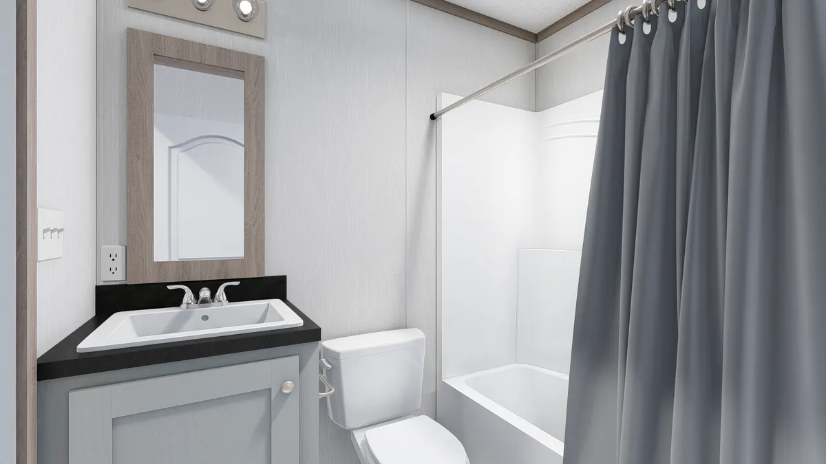 The 5624-E734P THE PULSE Guest Bathroom. This Manufactured Mobile Home features 3 bedrooms and 2 baths.