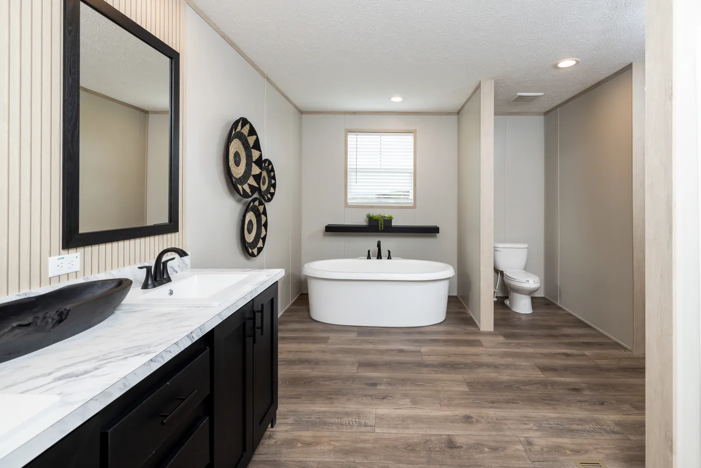 The VISION Primary Bathroom. This Manufactured Mobile Home features 4 bedrooms and 2 baths.