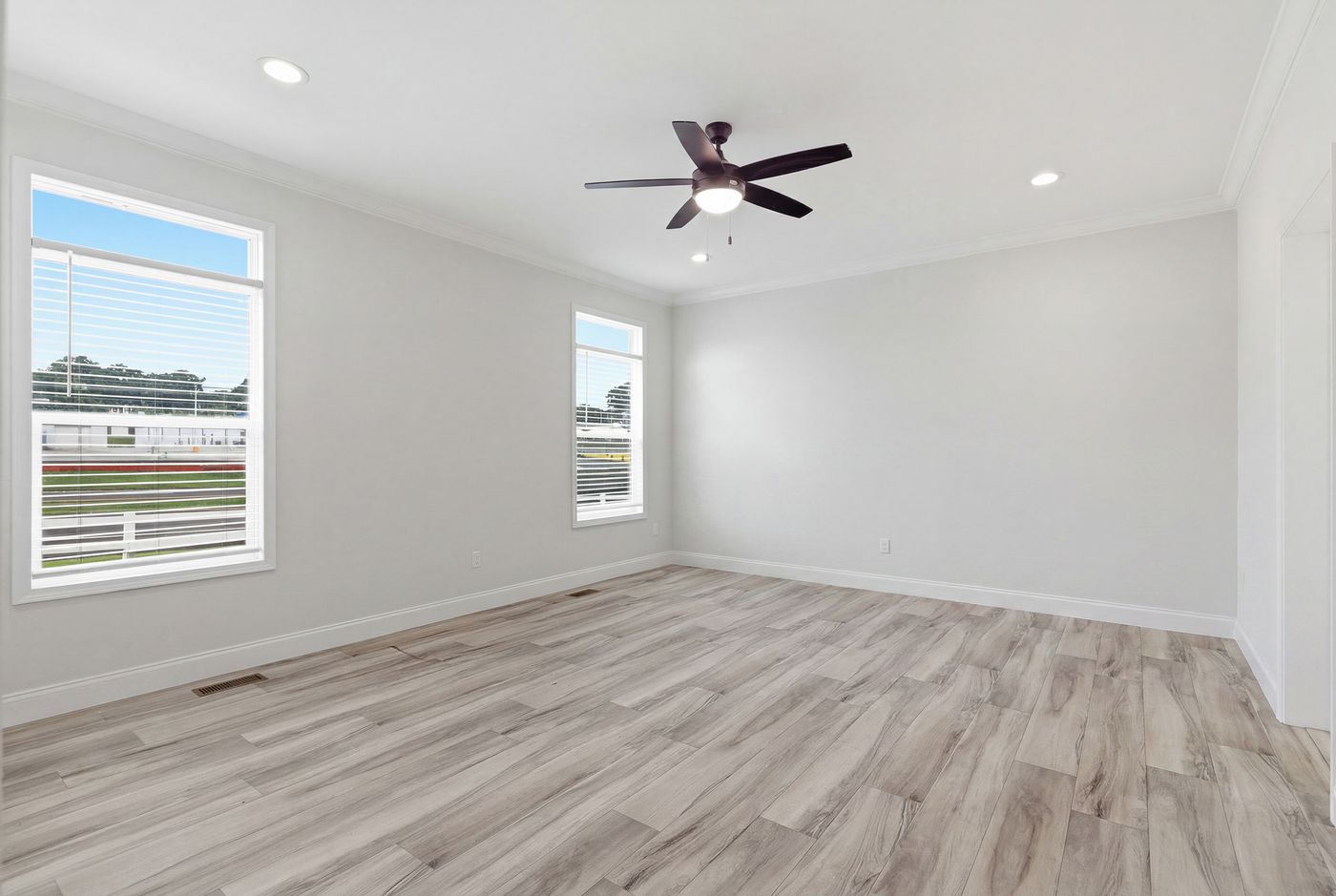 The THE SUMMIT Primary Bedroom. This Manufactured Mobile Home features 3 bedrooms and 2 baths.