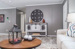 The CASCADE Living Room. This Manufactured Mobile Home features 4 bedrooms and 2 baths.
