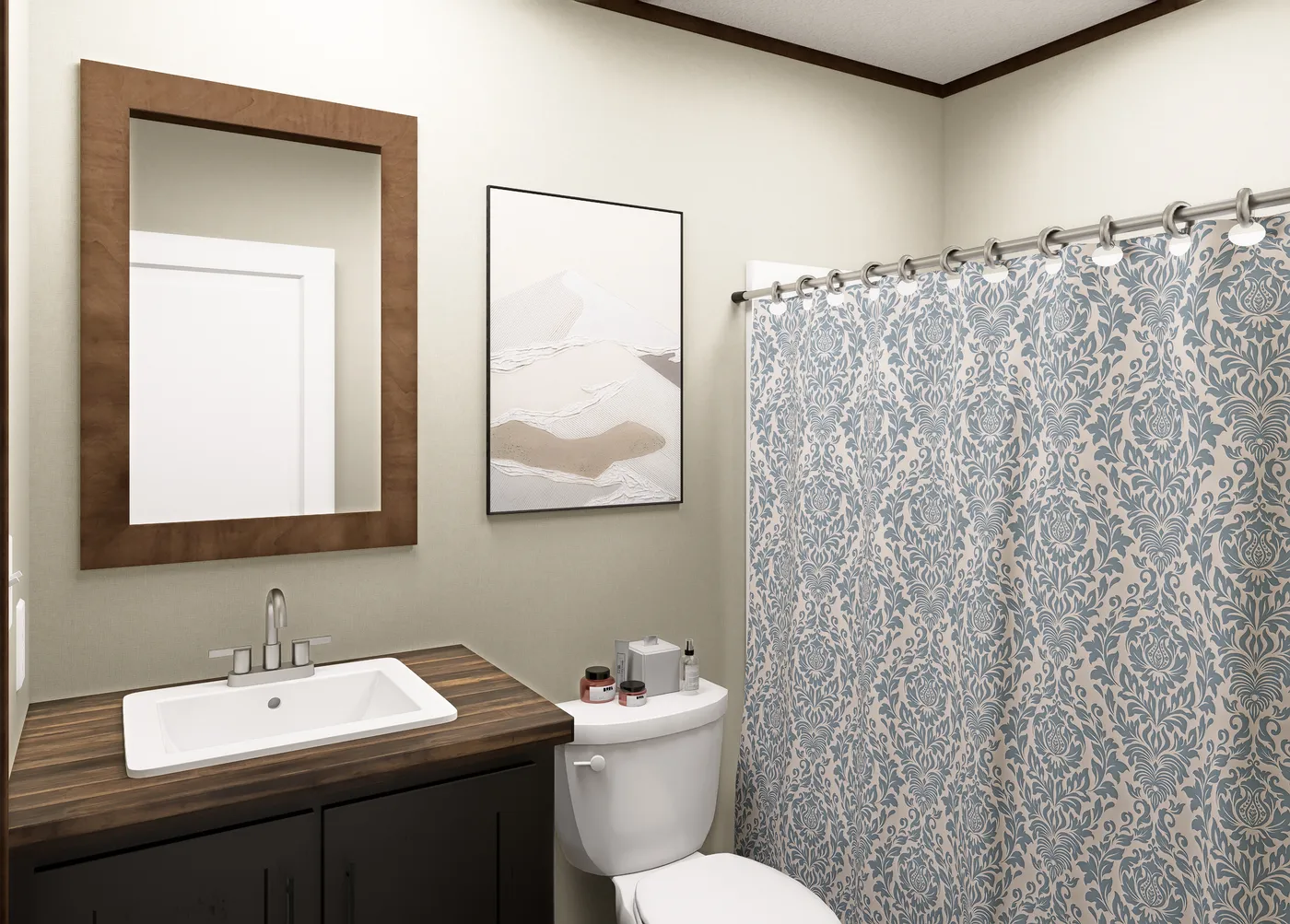 The MAGELLAN Guest Bathroom. This Manufactured Mobile Home features 3 bedrooms and 2 baths.