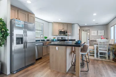 The RESOLUTION 16763J Kitchen. This Manufactured Mobile Home features 3 bedrooms and 2 baths.