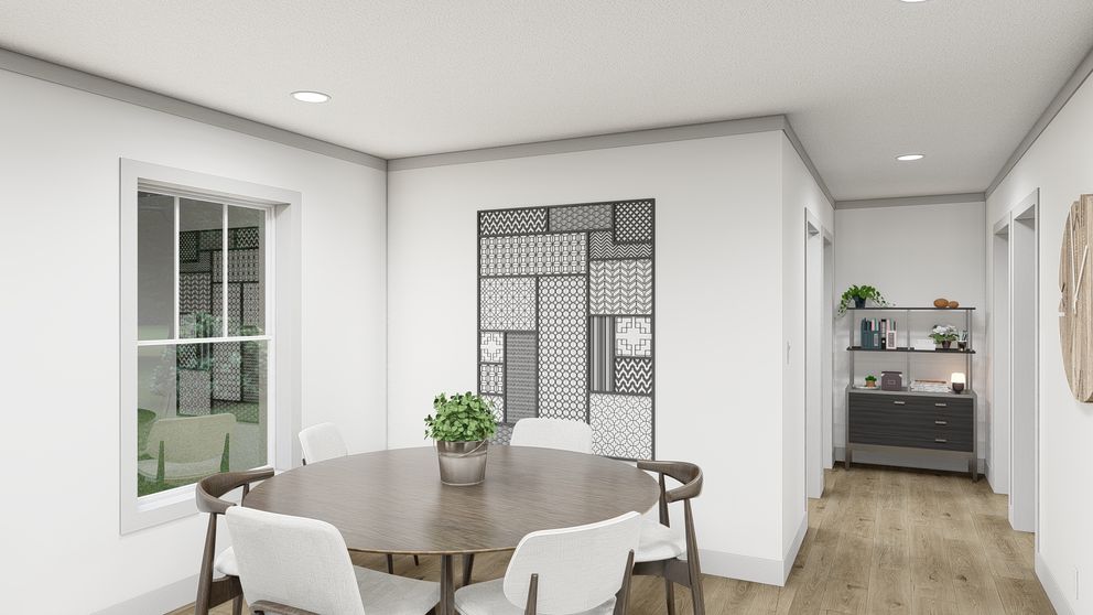 The WONDERFUL WORLD Dining Area. This Manufactured Mobile Home features 3 bedrooms and 2 baths.