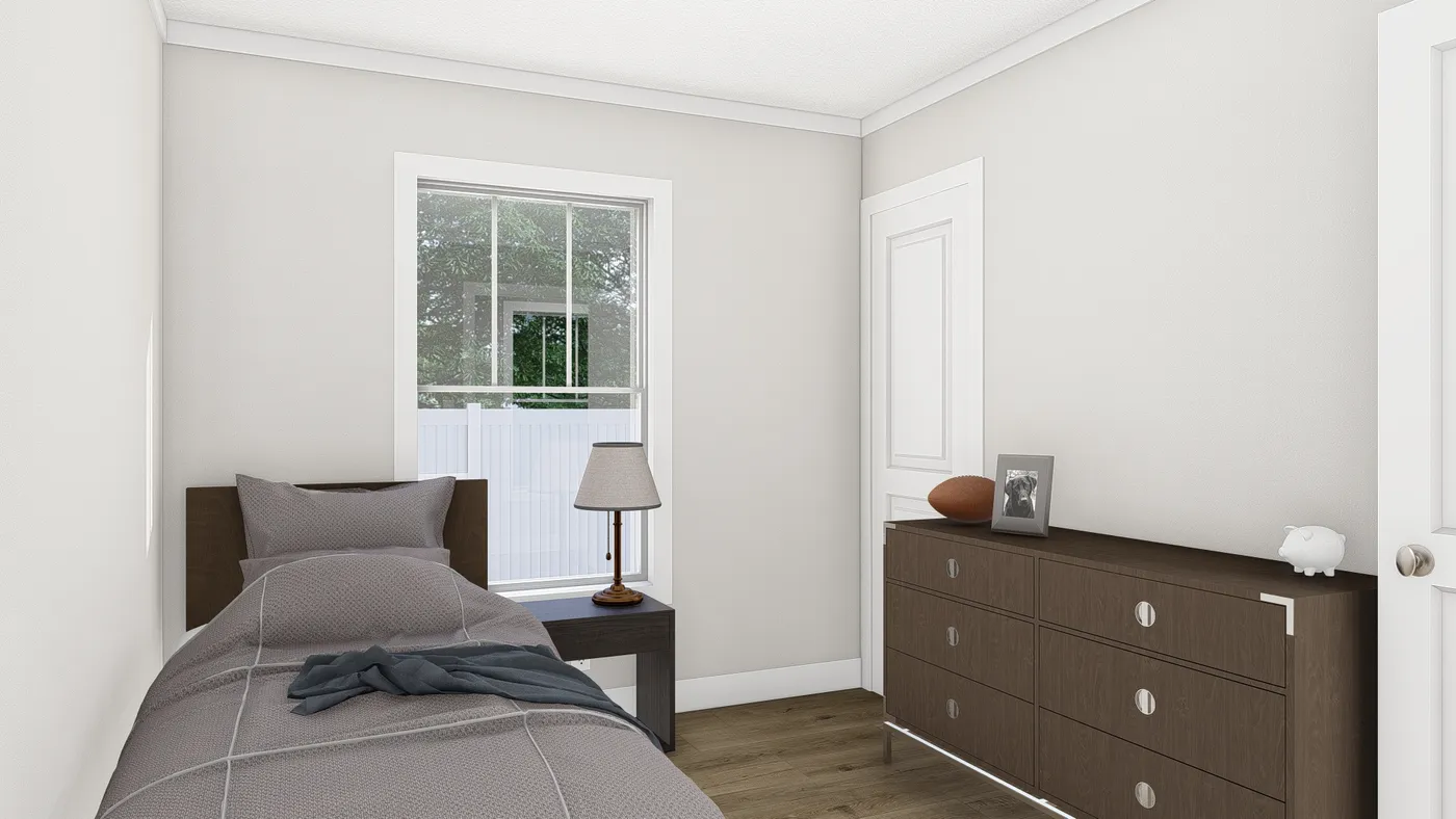 The RHYTHM NATION Guest Bedroom. This Manufactured Mobile Home features 3 bedrooms and 2 baths.