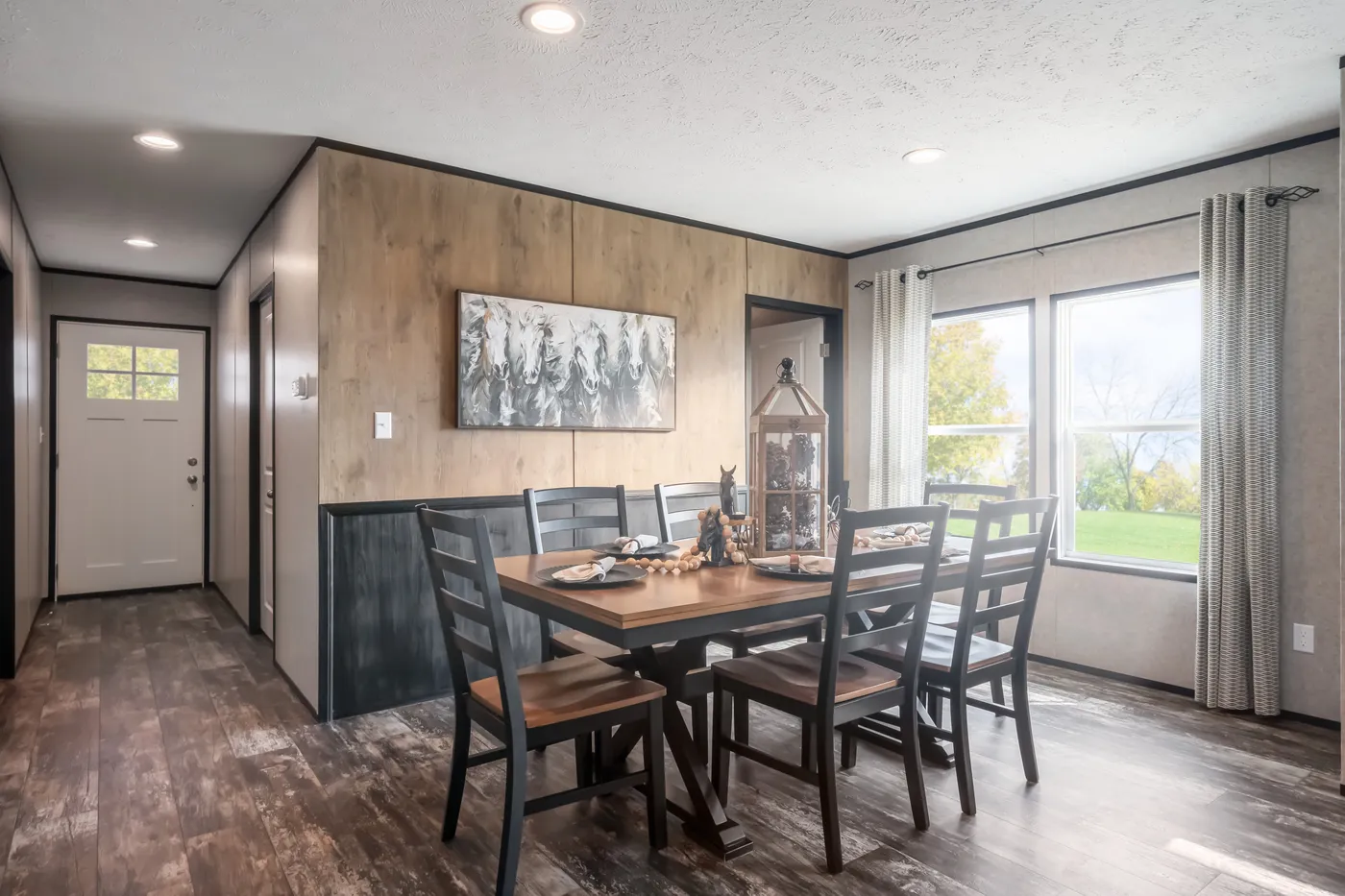 The THE TRIBUTARY Dining Room. This Manufactured Mobile Home features 3 bedrooms and 2 baths.