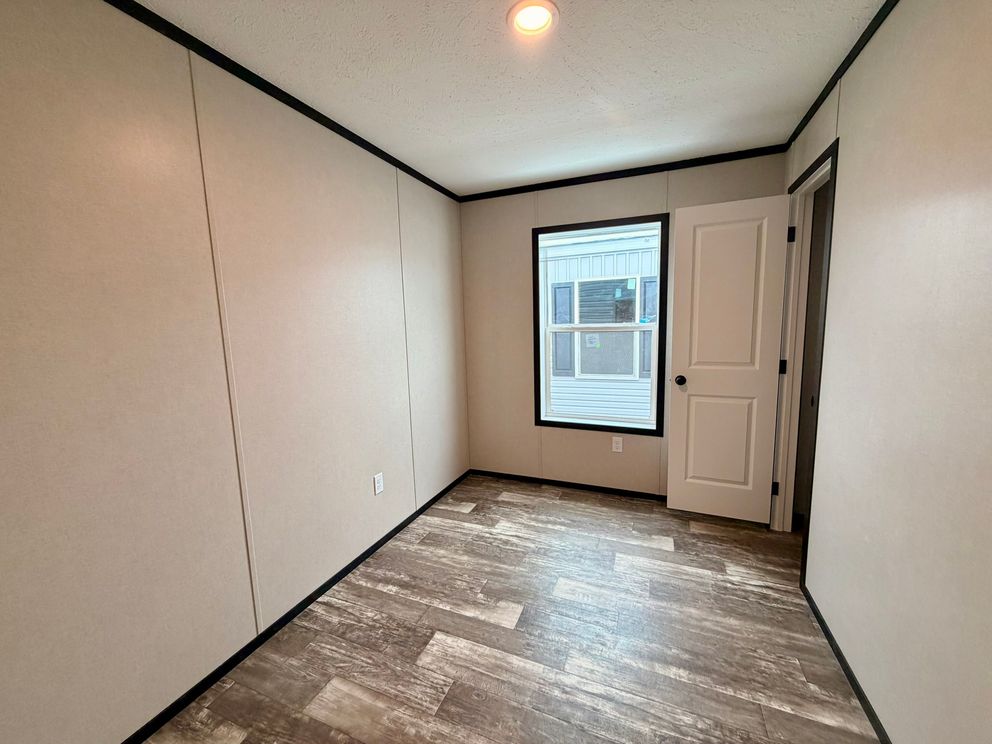 The PEARL Guest Bedroom. This Manufactured Mobile Home features 3 bedrooms and 2 baths.