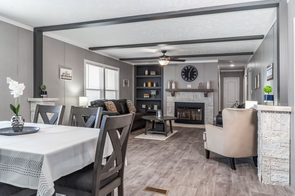 The THE FUSION 32B Dining Room. This Manufactured Mobile Home features 4 bedrooms and 2 baths.