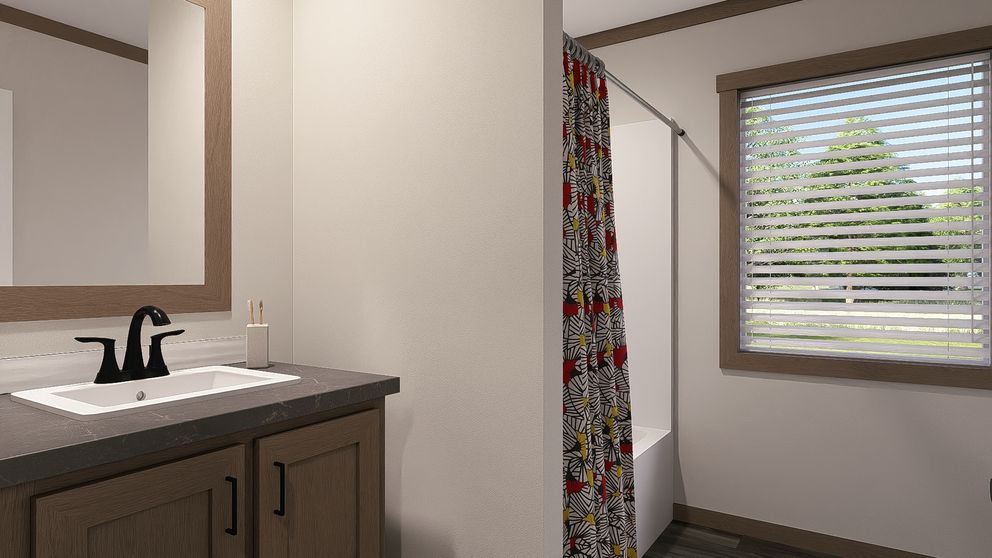 The FARM 4 FLEX Guest Bathroom. This Manufactured Mobile Home features 4 bedrooms and 3 baths.